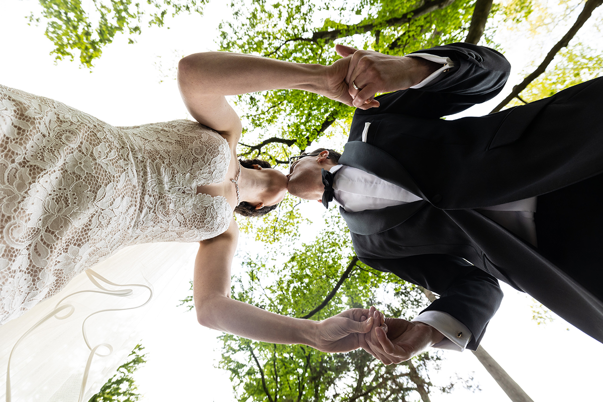A romantic kiss by Peter oberc wedding photography westchester country club rye bride groom